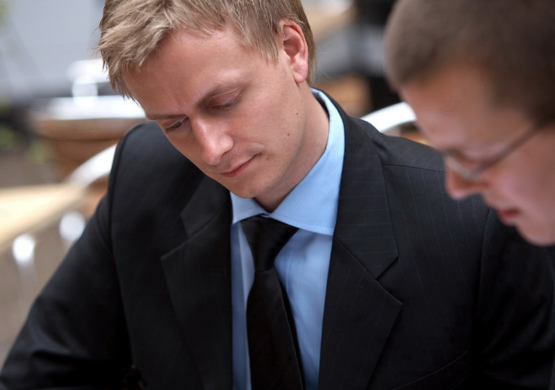 Two business owners reviewing their company credit score together